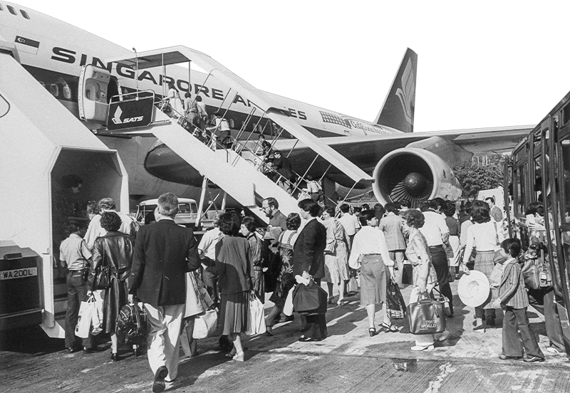 Passengers boarding a Singapore Airlines plane at Changi Airport, 1981. Civil Aviation Authority of Singapore Collection, courtesy of National Archives of Singapore.